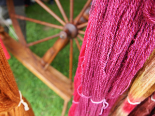 Pink Yarn With Spinning Wheel