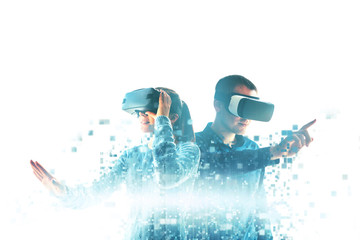 Wall Mural - A young woman and a young man in virtual reality glasses are fragmented into pixels.The concept of modern technologies and technologies of the future. VR glasses.