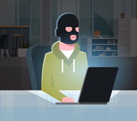Poster - man black mask sitting at computer hacker activity concept viruses data privacy attack internet info