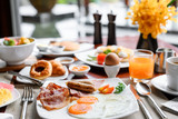 Fototapeta  - Setting of breakfast dishes in hotel restaurant