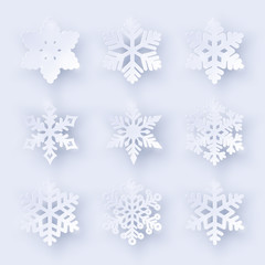 vector set of 9 paper cut snowflakes with shadow on white background. new year and christmas design 