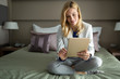 © NDABCREATIVITY - Portrait of attractive businesswoman in hotel room