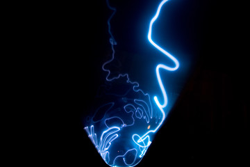 plasma tunnel with blue and light blue flashes. big electric shocks in an path. blue lightning storm