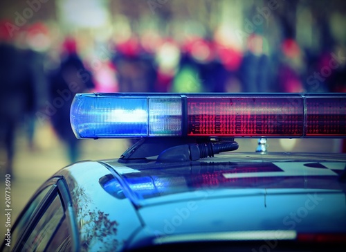 Photo  Police car with lights of sirens with vintage effect