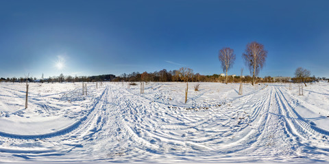 Wall Mural - full seamless spherical panorama 360 by 180 degrees angle view on the snow covered field in sunny winter day with halo in equirectangular projection, skybox VR virtual reality content