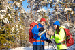 © Bondariev Volodymyr. - Walk through the winter forest with a backpack and tent.