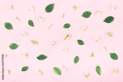 White flowers pattern on pink background. Pattern made of jasmine flowers. Pa...