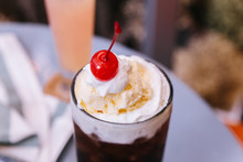 Sweet Refreshing Cherry Cola Topping With A Scoop Of Vanilla Ice Cream And Fresh Cherry.