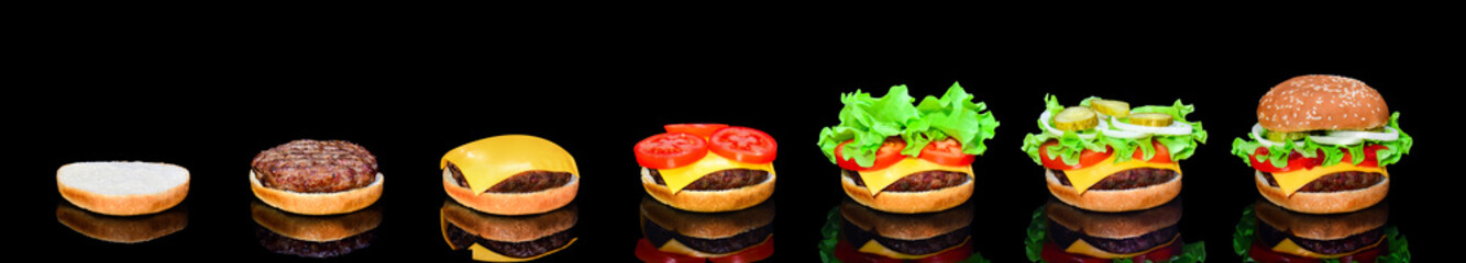 Process making of burger, step by step isolated on black background. Burger wide banner. Split burger. Burger divided in parts