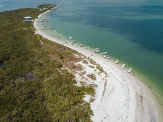 beach aerial drone above view white sand boats sea water island