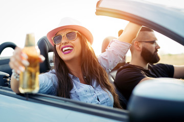 Wall Mural - The happy couple sit in the cabriolet