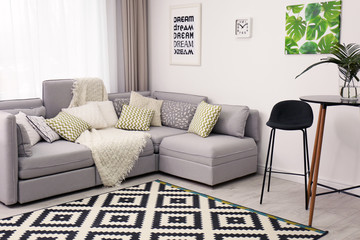 Sticker - Beautiful room interior with comfortable sofa