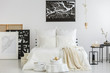 © Photographee.eu - Scandi bedroom with contemporary paintings