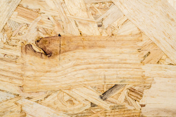 Wall Mural - surface texture of oriented strand board (OSB), Wood board made from piece of wood