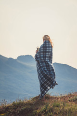 Canvas Print - People in the background of mountains