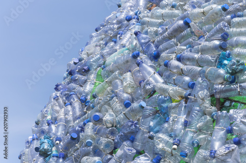 Fotografie, Obraz A lot of plastic waste bottles with a beautiful blue sky in the background