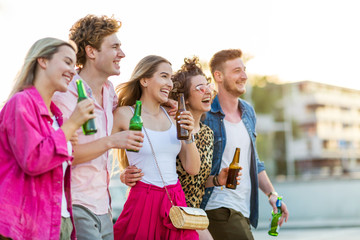 Wall Mural - Group of friends drinking beer together
