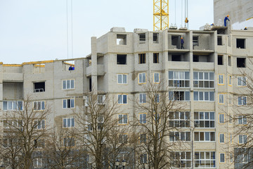 Unfinished brick multi-storey residential building. Civil engineering.