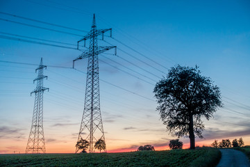 Poster - Strommasten nach Sonnenuntergang