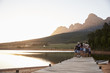 © Monkey Business - Rear View Of Multi Generation Family Standing On Jetty By Lake