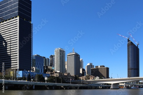 Cuadros en Lienzo Motorway on river waterfront with Victoria bridge and skyscrapers in Brisbane, A