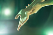 Dancer's hand gesture in green light