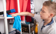© leszekglasner - Preteen boy doing housework and cleaning his room