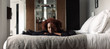 © visualspectrum/Stocksy - Young Pretty African Woman Lying on Hotel Bed With Eyes Closed