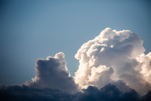 Close-up Of Cumulus Clouds Forming With Silver Lining