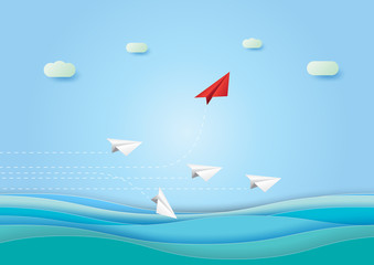 Wall Mural - business leadership concept with red paper plane change direction from the white group.paper art vec