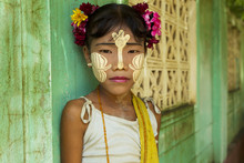 Young Burmese Girl With Tanaka On Her Face