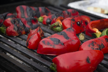 Red sweet peppers roasted on the grill