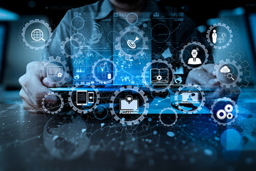Poster - businessman hand working with modern technology digital tablet computer and digital layer effect