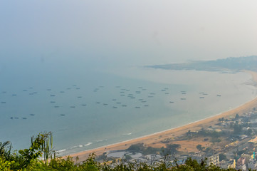 Photograph of sea beach taken from a distance during Christmas Holiday or New Year celebration time in landscape style Use for screen saver e-cards website banner usage Travel vacation holiday concept