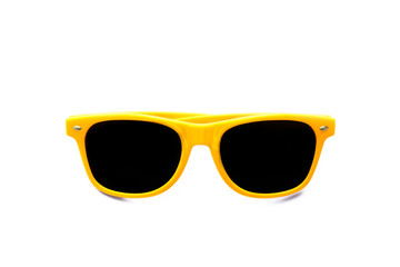 Summer yellow sunglasses isolated in seamless white background. Minimal design element for sun protection, hot days, tropical travel, summer vacations and beach holidays.