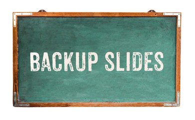 Fototapete - “Backup Slides” text word message written on a wide green old grungy vintage wooden chalkboard or retro blackboard with frame isolated on white background.