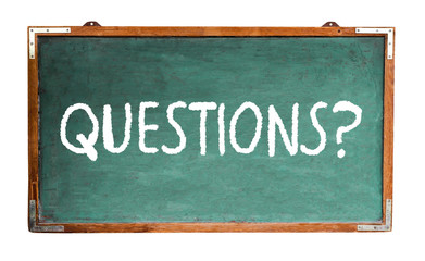Fototapete - Questions? text word message in white chalk written on a wide green old grungy vintage wooden chalkboard or retro blackboard with frame isolated on white background.