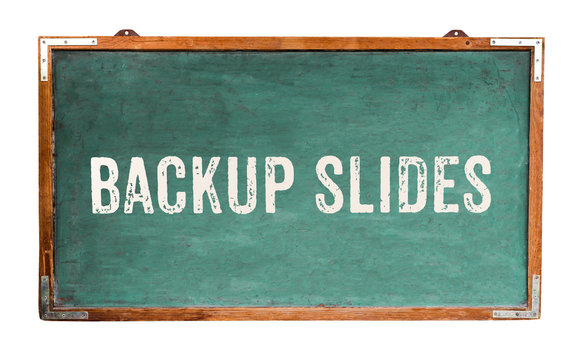“Backup Slides” text word message written on a wide green old grungy vintage wooden chalkboard or retro blackboard with frame isolated on white background.