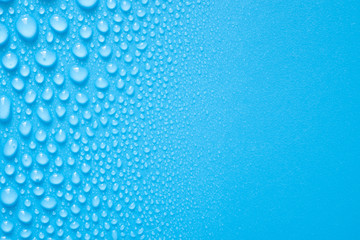 Water drops on blue background