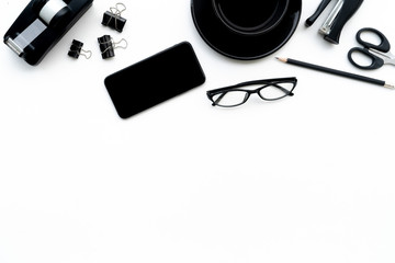 Poster - Flat lay of top view modern white desk work table with computer laptop and stationary in home office includes copyspace for add text or graphic