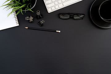Fototapete - Flat lay of top view modern black desk work table with computer laptop and stationary in home office includes copyspace for add text or graphic