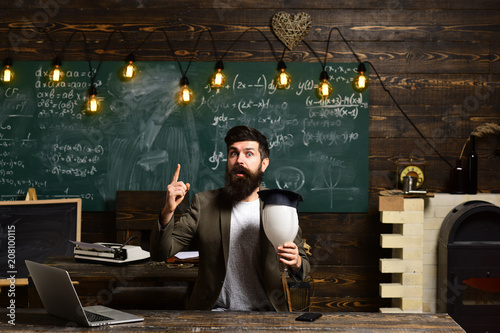 Scientist Hipster With Lightbulb On Chalkboard Bearded Man Hold