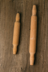 Wall Mural - two rolling pins lie on the table