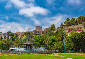 Wall Mural - Fountain with the Alcazaba of Malaga, Spain