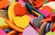 background of many colored hearts made of felt