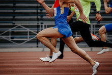 Race Men Sprinters Runners In 100 Meters At Track Stadium