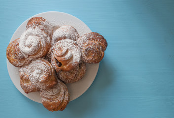 top view at handmade bun roll with wooden painted background 