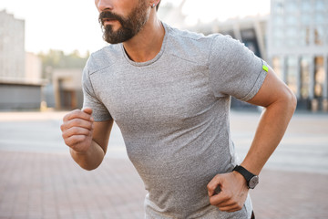 Wall Mural - Cropped photo of handsome strong mature sportsman