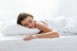 © puhhha - Soft Pillow. Female Sleeping In Bed On White Bedding