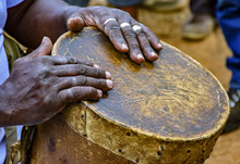 Percussionist Playing A Rudimentary Atabaque During Afro-brazilian Cultural Manifestation